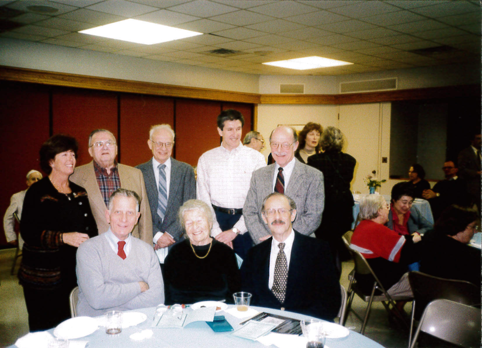 Presidents of the synagogue, at Jewish Theological Seminary of America program honoring Gerda Seligson. Standing, left to right: Susie Coran (1981-85), Henry Gershowitz (1970, 1994-95), Marty Sichel (1966), Errol Soskolne (1996-97), Saul Hymans (1969). Sitting: Carl Cohen (1979), Gerda Seligson (1971-73), Eduardo (David) Schteingart (1974-78).